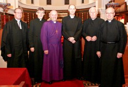 The Rev Tim Close (third right) is pictured prior to his institution as rector of Eglantine, with (from left) the Rev William Taggart, diocesan registrar; the Rev Clifford Skillen, bishop's chaplain; the Bishop of Connor, the Rt Rev Alan Abernethy; the former Dean of Belfast, the Very Rev Dr Houston McKelvey, who preached at the service; and the Rev Peter Galbraith, rural dean of Lisburn. (Photo: David Orr)